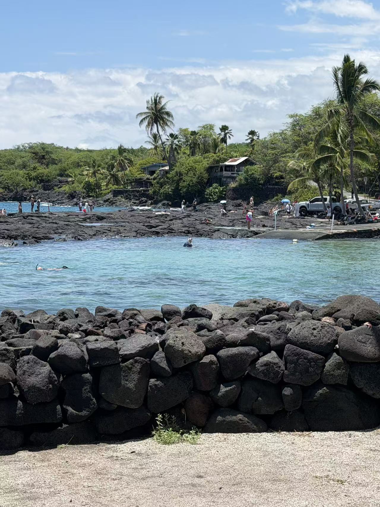 Historic coastal cove edged with lava rock